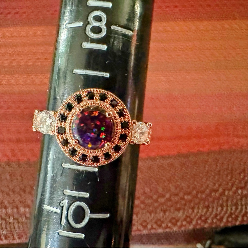 Fragrant Jewels Gold Ring with Black and Multicolor Gem